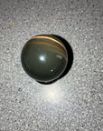 Black Cat’s Eye or Dark/Oxidized Tiger’s Eye.